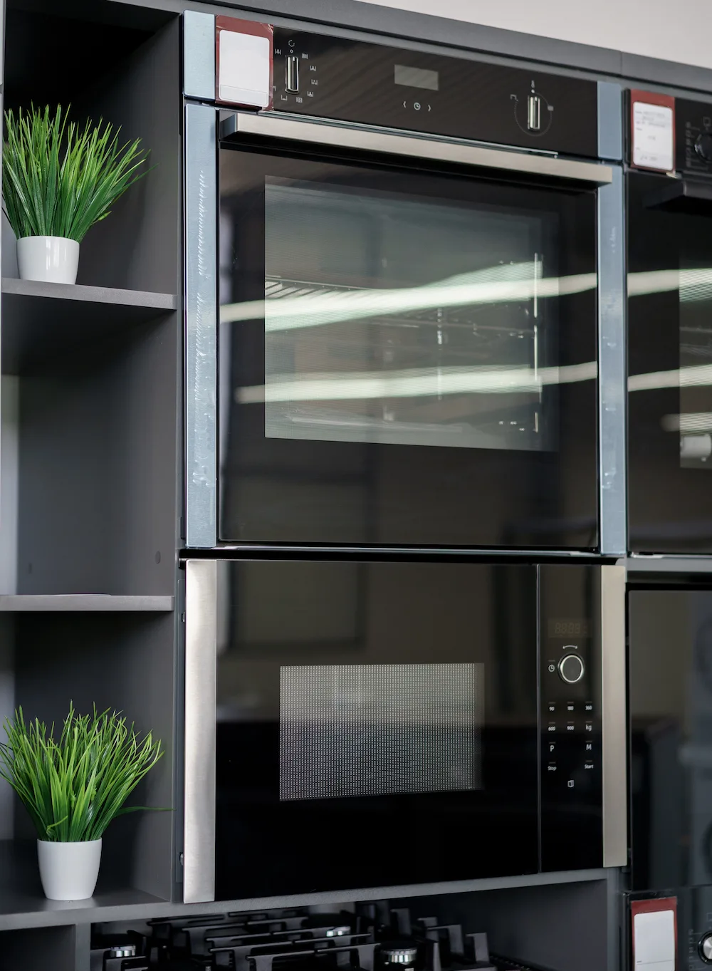 Electrical ovens, home appliances in the store..